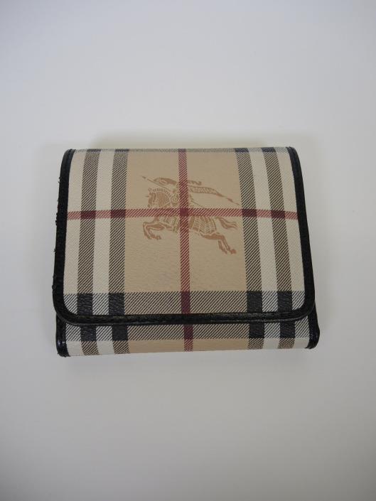 BURBERRY Haymarket Leighton Wallet Retailed for $295, sold in one day for $129. 06/24/17 Compact and practical, this fold up style wallet is designed to hold a lot without too much bulk.