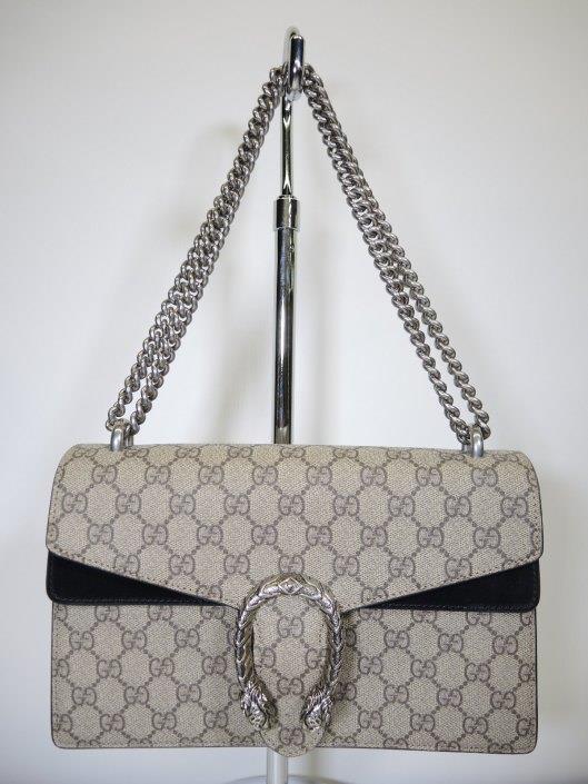 GUCCI Small Dionysus Supreme GG Shoulder Bag Retails for $2,290, sold in one day for $1,800.