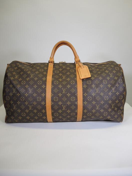 LOUIS VUITTON Keepall 60 Duffle Sold in one day for $699. 06/10/17 Ready for a long vacation? Travel in style with this extra large duffel bag in Louis Vuitton s signature brown monogram.