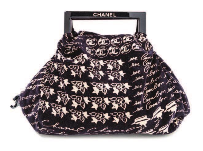 $4,000-6,000 81 AUCTION HIGHLIGHTS 83 A Chanel Black Quilted Weekender Roller Bag, 2011, black coated nylon with silvertone and ruthenium hardware, black leather logo accents, double handles, one