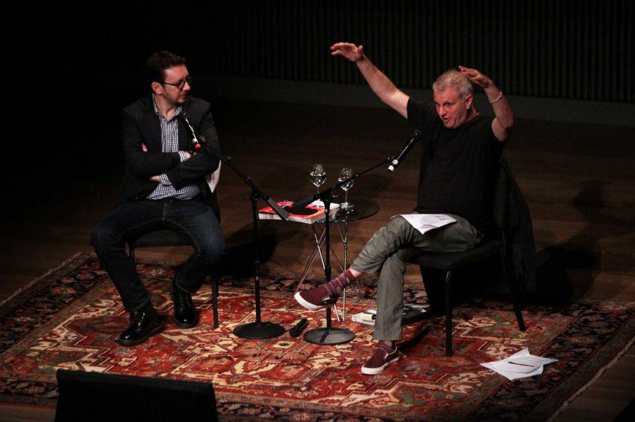 New York Times culture reporter Randy Kennedy (left) moderates a conversation with photographer Jim Goldberg at the SFJAZZ Center, Wednesday, Feb. 25, 2015, in San Francisco, Calif.