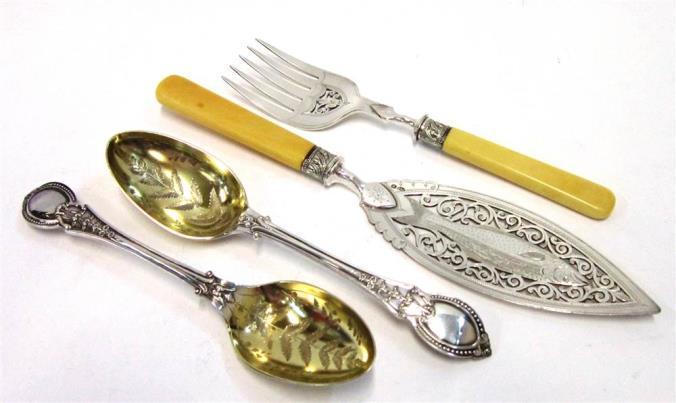 forks, in a fitted case Lot 86 87 A GOOD PAIR OF VICTORIAN ELECTROPLATED SERVING OR TABLE SPOONS Unmarked, in very good condition with gilt bowls; together