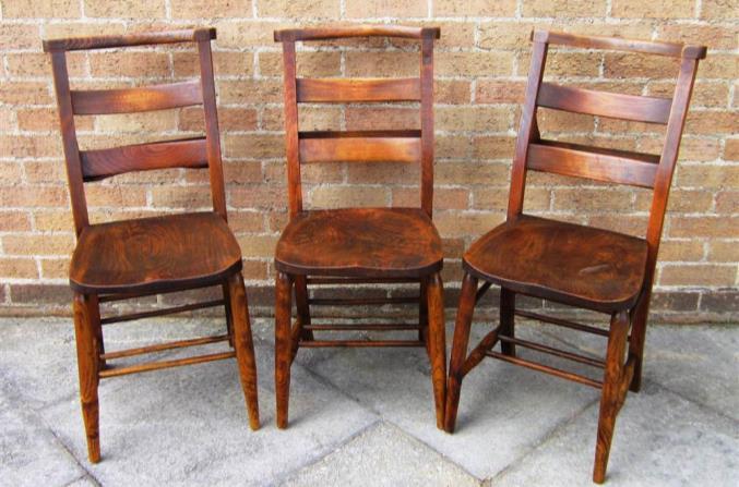 CHAPEL CHAIRS With railed backrests and fitted with book racks 488 A 19TH CENTURY BRASS BOUND WALNUT BOX Paper label