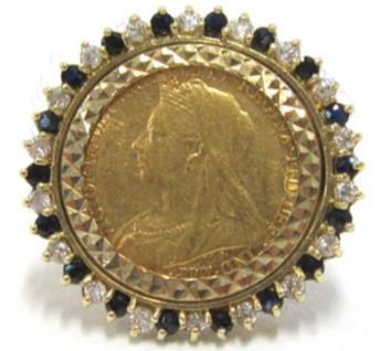 28 A GROUP OF VICTORIAN AND LATER JEWELLERY Comprising: a 9ct gold cameo brooch; a charm bracelet with assorted gilt metal and other charms; a plated sovereign case; a St