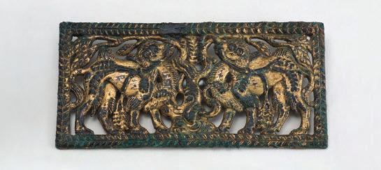 054 63 Pair of rectangular plaques of a recumbent wolf, argali rams and gazelles North China (Xiongnu culture), 3rd 2nd century BCE Gilt bronze, 4.5 x 9.