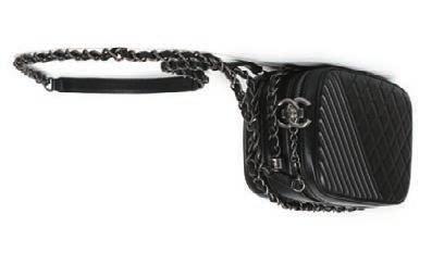 479 Chanel black leather shoulder bag date code for 2010-11, lambskin with silver tone hardware, chain handles and zipped central compartment, 34cm wide, 24cm high 700-1,000 480 Chanel Coco Boy