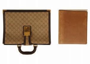 22cm wide, 16cm high, the second brown with leather shoulder strap, 27cm wide, 20cm high (2) 593 Hermes Vue du