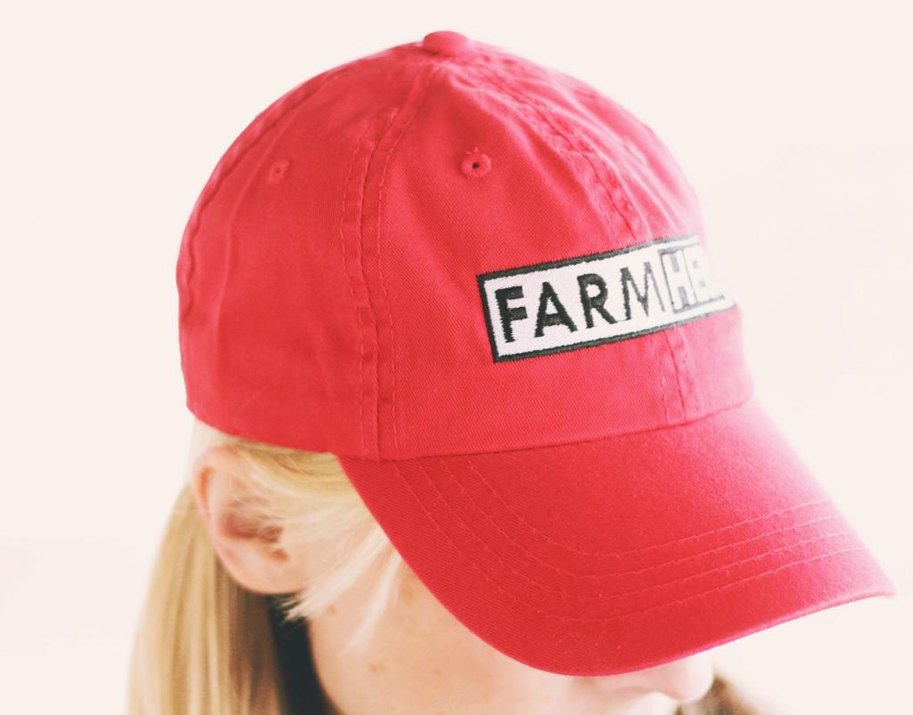 Item No. 26 FarmHer Twill Cap Retail Price: $20 USD Wholesale Price: $10 USD Imprint reads: FarmHer Color: Red This low profile, 6-panel twill hat is a one-size fits most.