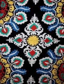 SPECIFIC COMMENTS Create large round floor pillows, using the traditional embroidery from the wall hanging above.