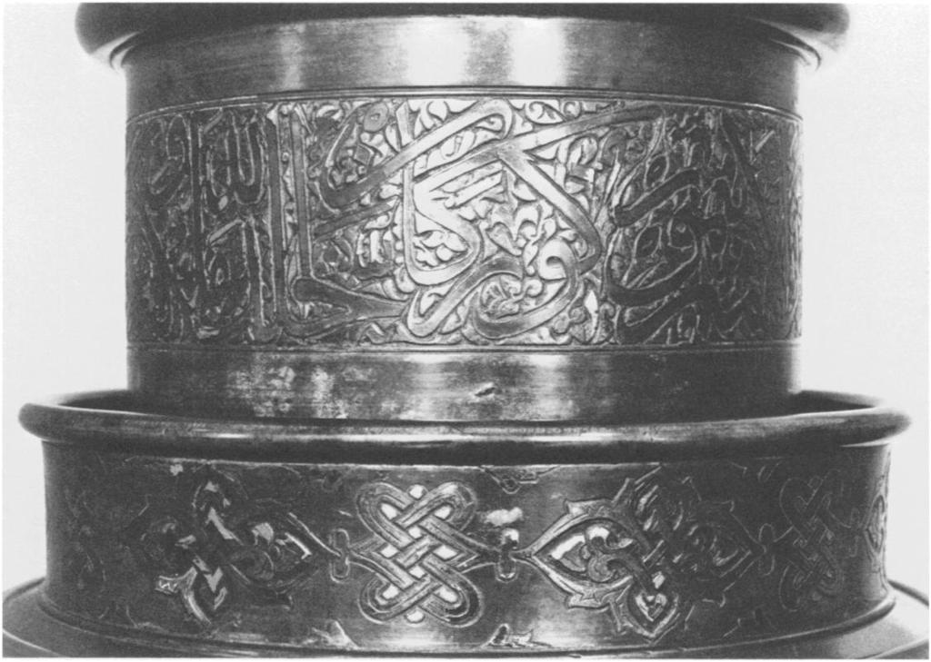 1. Detail of the upper portion of an oil lamp, Timurid, I40I- 5. Bronze inlaid with gold and silver. Leningrad, State Hermitage, inv. no. SA 15931 (photo: Komaroff) 2.
