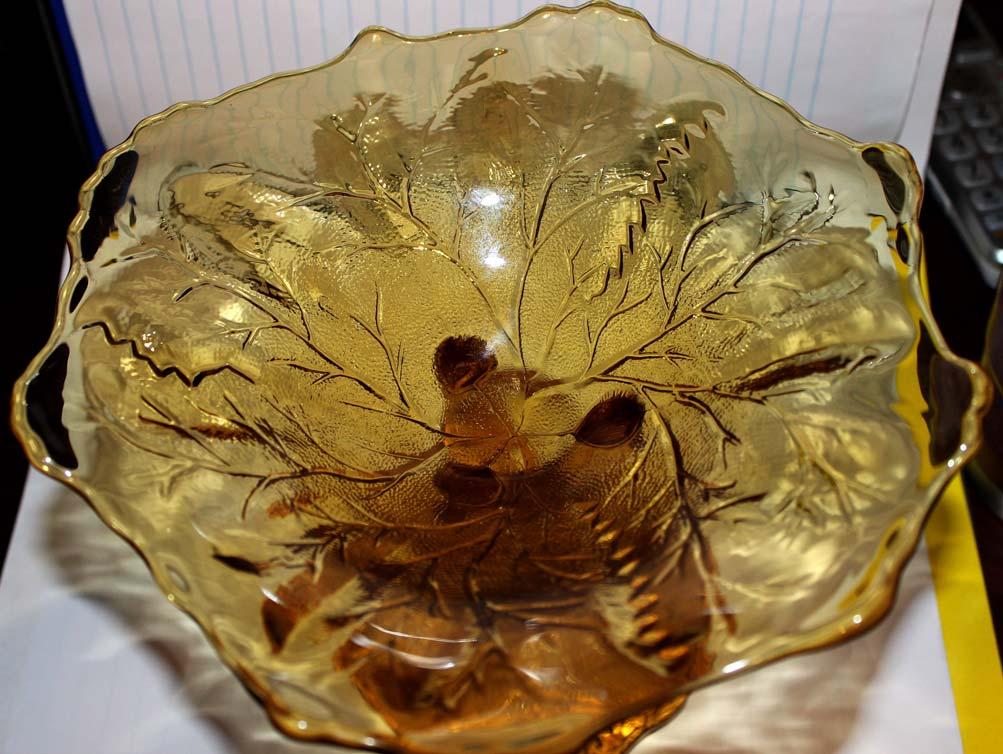 Abb. 2015-3/11-04 Bowl as a leaf with a foot as a twig, amber coloured pressed glass, leaf