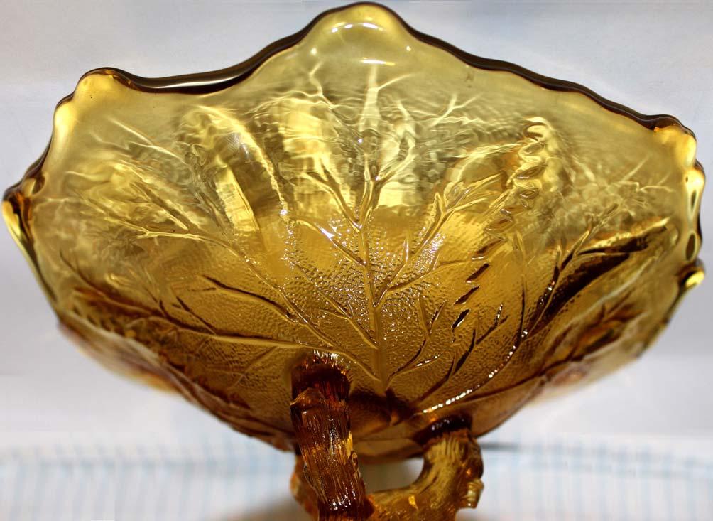 Abb. 2015-3/11-05 Bowl as a leaf with a foot as a twig, amber coloured pressed glass, leaf