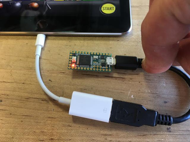 OK, time to test it on the ipad or iphone! Open your notepad app on the ios device, and then plug the Teensy into it with a USB micro B/A cable and the USB to Lighting "camera adapter".