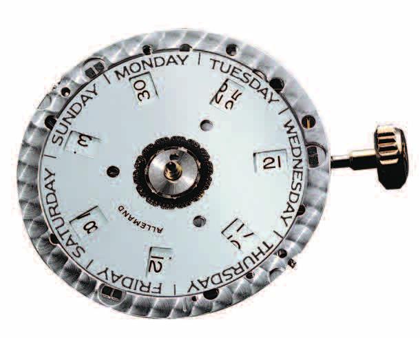 THE 26 LANGUAGE OF THE DAY-DATE An under-the-dial view of the Caliber 3155.