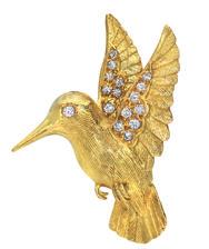 . M452: 18K y.g. hummingbird pin, accented with.32 ctw. diamonds, $2,900.. R7227: andcrafted 3.
