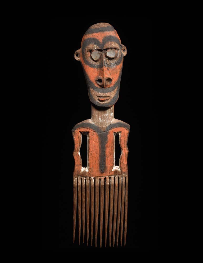 11 ~ Comb Gogodala people, Fly River Delta, Gulf of Papua, Papua New Guinea 19th century Height: 11¼ inches / 28.6 cm Wood, pigment Collected by Frank Heald Sr.