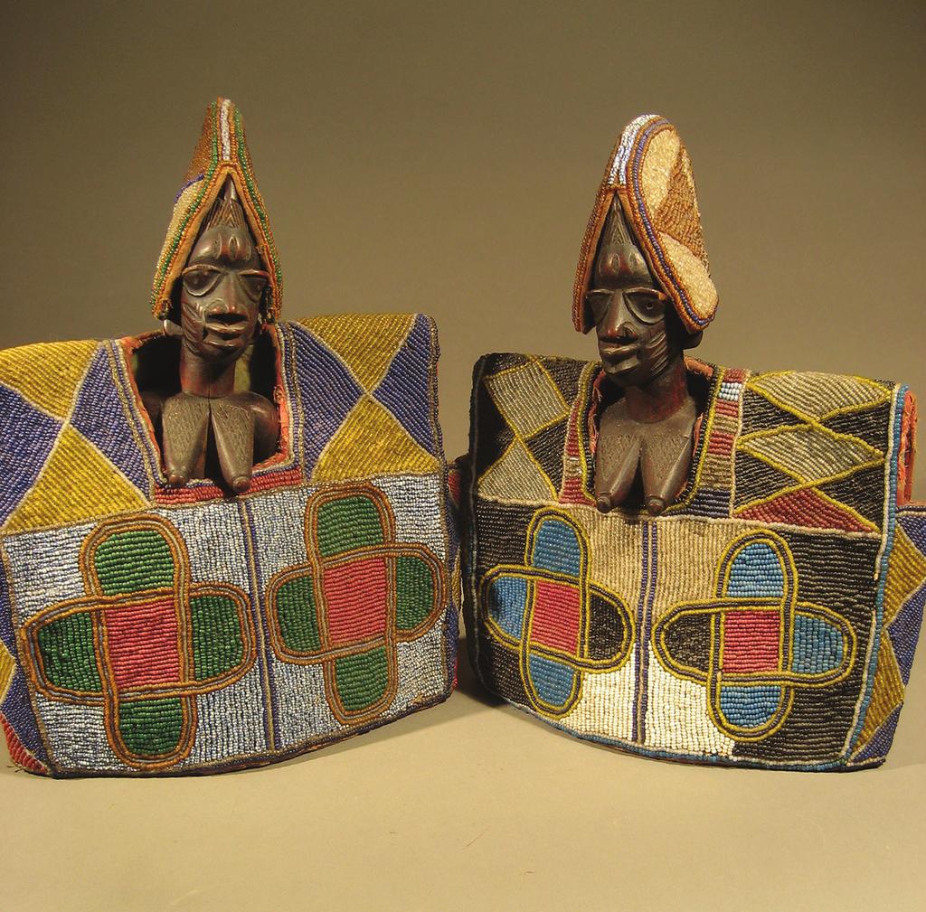 A trained Yoruba sculptor, Ona [1900-1952] combined colonial-style clothing pith helmets and umbrellas with African-style figures, in works created to sell to Europeans.