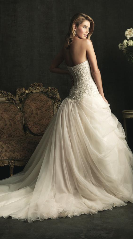 sweetheart neckline. The ballgown skirt drapes to create a romantic silhouette.