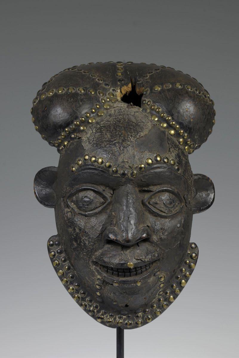 Cameroon; Kom peoples Mask, copper, brass 39.69 x 32.07 x 15.88 cm (15 5/8 x 12 5/8 x 6 1/4 in.) The Stanley Collection, X1990.