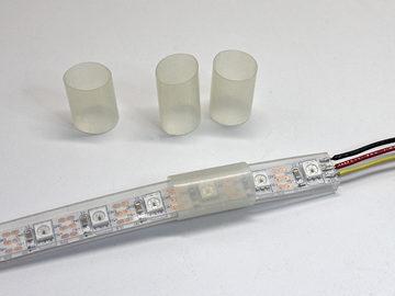 While your glue gun warms up, cut some pieces of clear heat-shrink tube, about 3/4 to 1 inch long. You ll need two for each strip. The tubing used here is about 1/2 inch in diameter before heating.