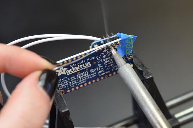 Solder the lipoly backpack to the audio board with the included long headers. Trim the rest of your headers and solder them in place on the audio board.