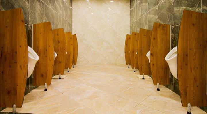 Timber-Veneer urinal partitions Cubicles Urinals Complimenting cubicles with matching urinal dividers can create a distinct and integrated architectural look for your washroom.