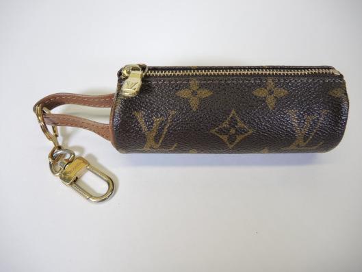LOUIS VUITTON Mini Cosmetic Case Sold in one day for $99. 05/27/17 Add this mini tube shaped case to the Louis you already carry and you will have a great organizer for your cosmetics.