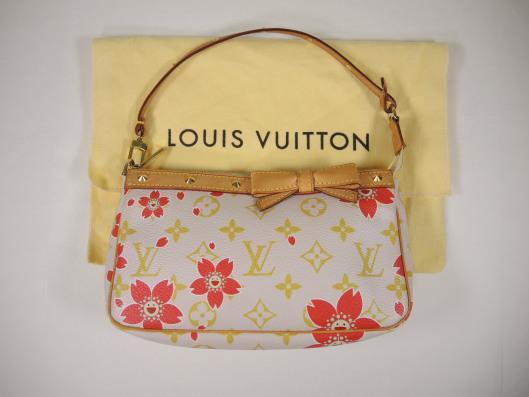 LOUIS VUITTON Takashi Murakami Cherry Blossom Pochette Retailed for $710, sold in one day for $399.