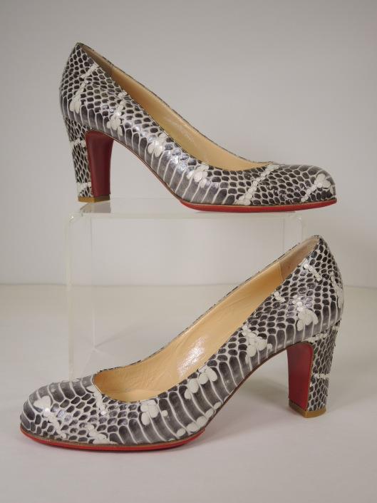 CHRISTIAN LOUBOUTIN Grey and Cream Snakeskin Pumps Size 7 ½ Retailed for $950, sold in one day for $279. 02/18/17 A luxurious neutral pump to add to your Spring wardrobe.