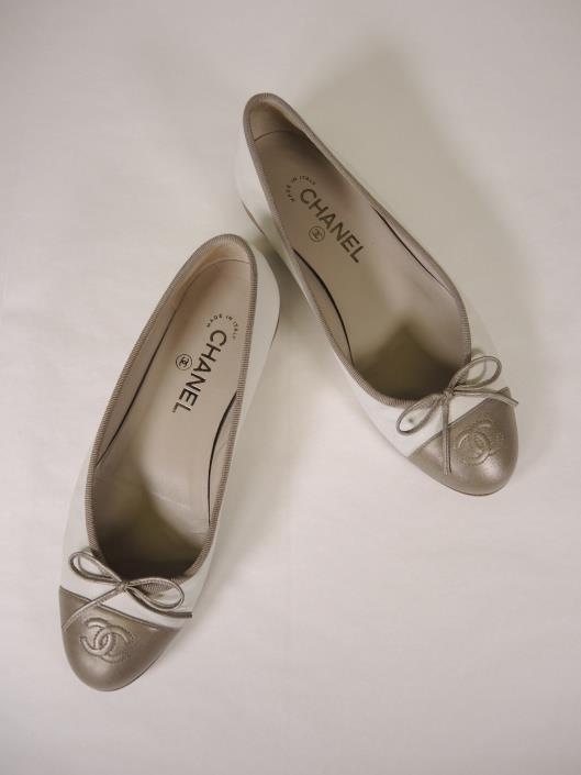 CHANEL Cream and Bronze Ballet Flats Size 7 ½ Sold in one day for $279. 02/18/18 Most days, we all want to just reach for our favorite pairs of flats instead of any type of heel.