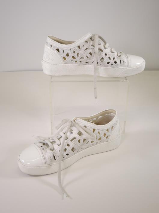 CHANEL Embroidered White Lace Up Sneakers Size 7 Sold in one day for $349. 05/06/17 Sneakers never looked so good as they do in these floral embroidered lace ups by French chic icon, Chanel.