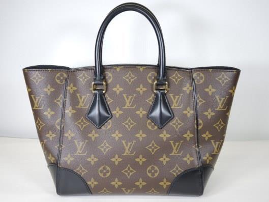 LOUIS VUITTON 2015 Phenix PM Monogrammed Crossbody Handbag Retails for $1960, sold in one day for $1400.