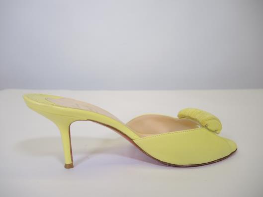 CHRISTIAN LOUBOUTIN Lemon Lime Mules Size 7 ½ Retailed for $750, sold in one day for $229. 04/08/17 These shoes are screaming for some sunny days.