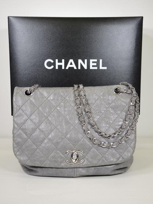 CHANEL 2013 Pewter Grey Quilted Leather Sac Rabat Flap Bag Retailed for $3400, sold in one day for $2400.
