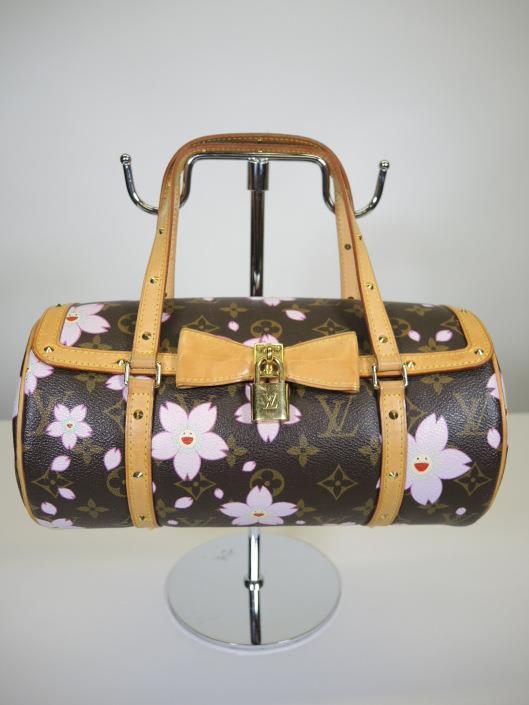 LOUIS VUITTON Murakami Cherry Blossom Papillon Retailed for $700, sold in one day for $499.