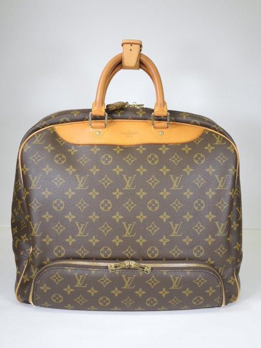 LOUIS VUITTON Brown Monogrammed Evasion Carry-All Luggage Retailed for $1980, sold in one day for $1000.