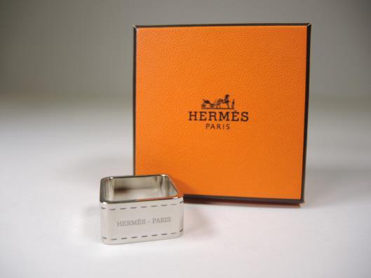 HERMÈS Silver Bolduc Scarf Ring Sold in one day for $119. 03/18/17 A signature accessory for Hermès scarf collectors.