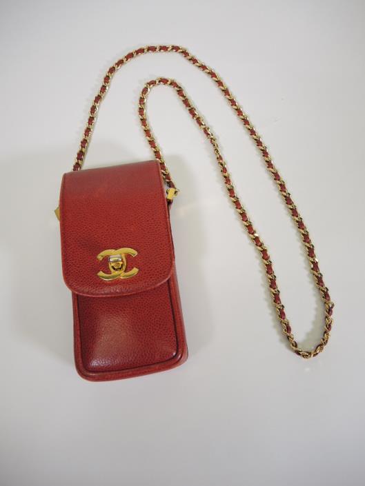 CHANEL 1997 Brick Red Tiny Crossbody Purse Sold in one day for $429. 03/11/17 This vintage gem is not large enough for most cell phones these days.