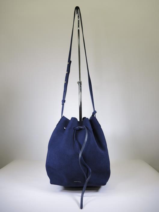 MANSUR GAVRIEL Navy Suede Bucket Bag With Pouch Retailed for $595, sold in one day for $299. 03/04/17 A favorite bag for the trendy gal, the bucket bag by Mansur Gavriel has quickly turned iconic.
