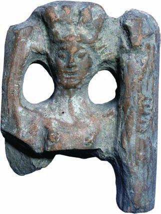 In the lower section the bust ends in the form of an isosceles triangle. The face features are vague and worn out and the hair enframes the forehead. 5. Handle (?), fig.