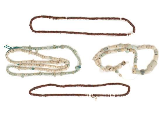 21 22 23 24 21 A GROUP OF ANCIENT BEADS AND NECKLACES Including two Egyptian mummy bead necklaces, restrung, the first composed of three steatite scarabs, Not Ancient, and glazed composition