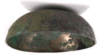 Provenance: From a Princely collection, Ex Christie s 30 April 2008, lot 16 (part). 250-350 31 A NEAR EASTERN BRONZE VESSEL A small shallow circular dish with smoothly rounded sides, 3.2cm high, 10.
