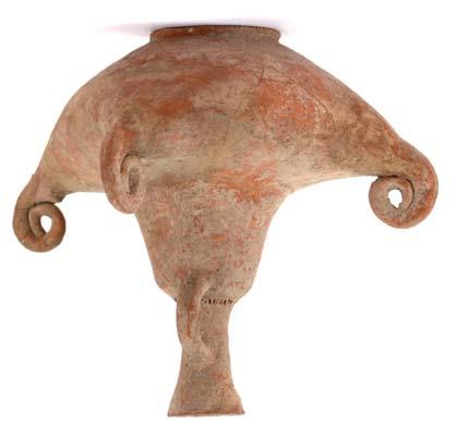 65 66 65 AN AMLASH GREY BURNISHED POTTERY GOURD North West Iran, circa 1 st Millennium B.C With funnel neck, side loop handle and three swollen compartments forming the vessel, 17.2cm high.