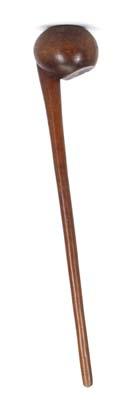 50-80 161 A POLE CLUB, FIJI ISLANDS Of hardwood, the long club is decorated with a finely incised design at the base and has a pierced hole through which a length of fiber is threaded, 51.2cm long.