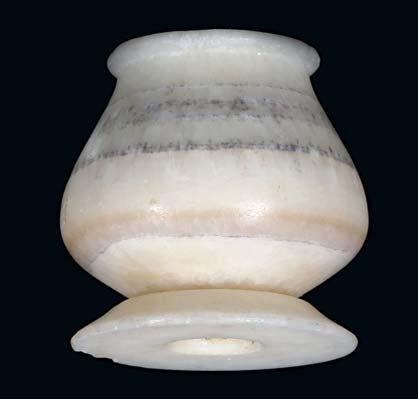 German private collection, formed by the present owner s father during the 1950s and 1960s. 800-1,200 7 AN EGYPTIAN ALABASTER KOHL VESSEL Middle Kingdom, circa 2133-1797 B.C.