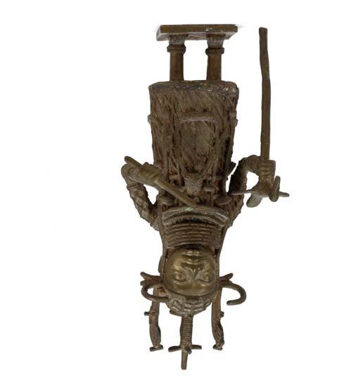 232 233 233 A BRONZE BENIN FIGURE OF AN OBA Standing on an integral square base the figure of the Oba, the ruler of the Benin kingdom, wears elaborate ceremonial dress and a