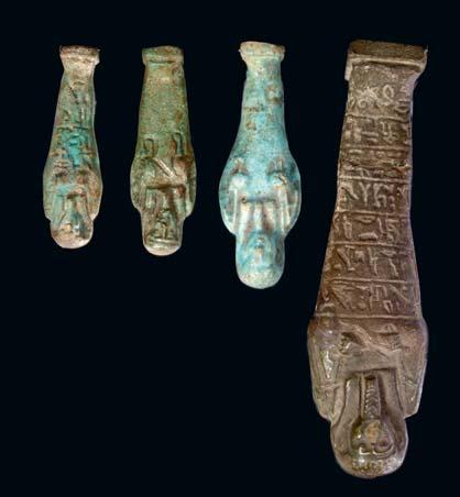 500-700 12 13 TWO EGYPTIAN BRIGHT BLUE GLAZED COMPOSITION SHABTIS Third Intermediate Period, 22nd-23rd Dynasty, circa 1069-945 B.C. Both worker shabtis with fillets and seed bags 19.3cm and 11.