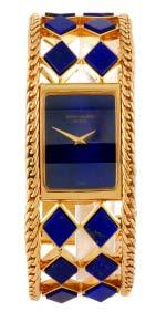 Borro 84 (146675) PATEK PHILIPPE - a lady s Stamped 18K 0.750 with poincon. Reference 4241 906, serial 2742952. Signed manual wind movement. Blue dial.