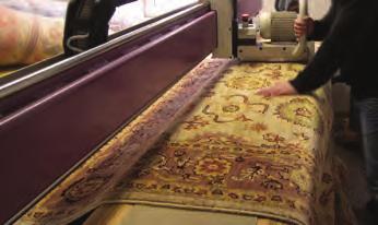 the unwanted and unnecessary fibres and defects of the rug