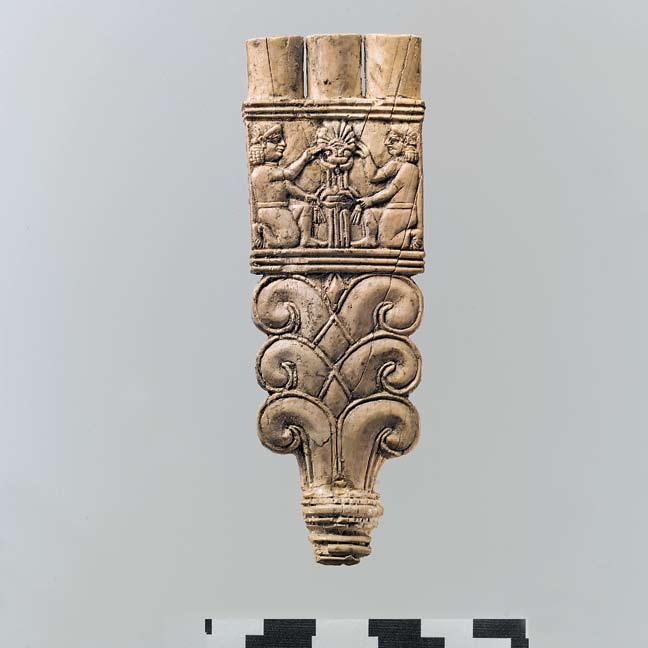1. Two faces of a fan handle from the Northwest Palace, Nimrud, Iraq. Neo-Assyrian, 7th century B.C. Ivory, 4 x 1 3 8 x 3 8 in. (10.2 x 3.5 x 1 cm).